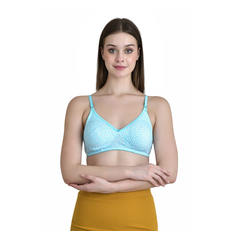 Sky blue polka dot print bra with thin straps and mustard yellow skirt - lingerie ecommerce photography by Lohar Studio Delhi